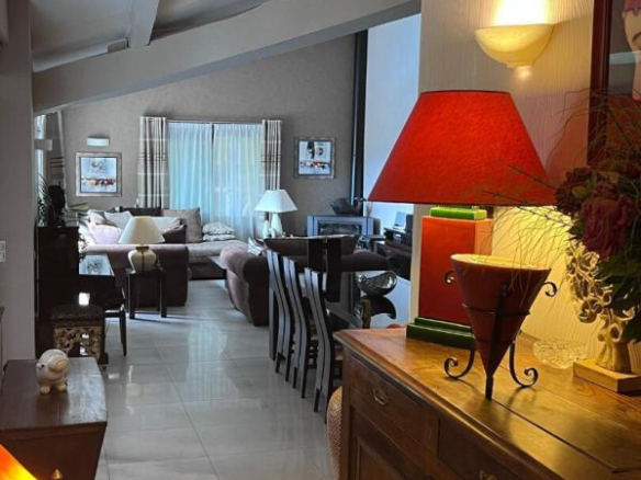 Interior of a house in Gattières with a spacious living room and elegant decor.