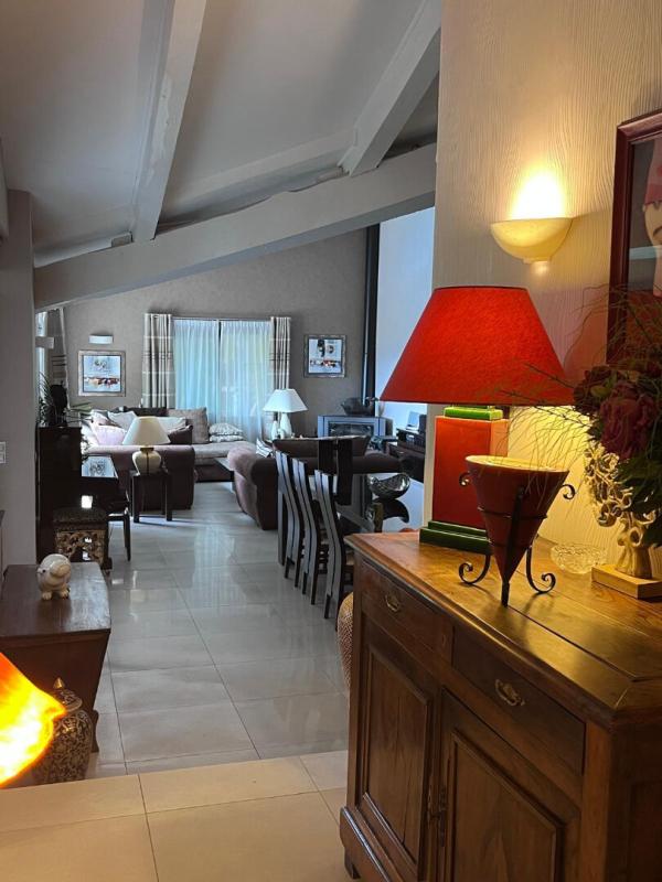 Interior of a house in Gattières with a spacious living room and elegant decor.