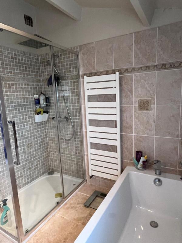 Modern bathroom with shower and bathtub