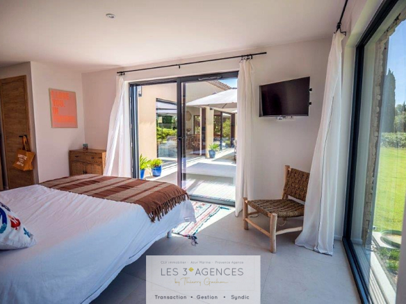 Room in a contemporary villa in Grimaud with garden view and outside access.