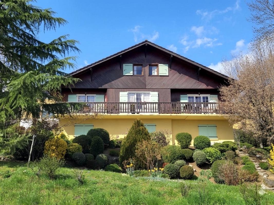 Traditional chalet in Grilly Large traditional chalet in Grilly with landscaped garden and views of the valley and the Alps.