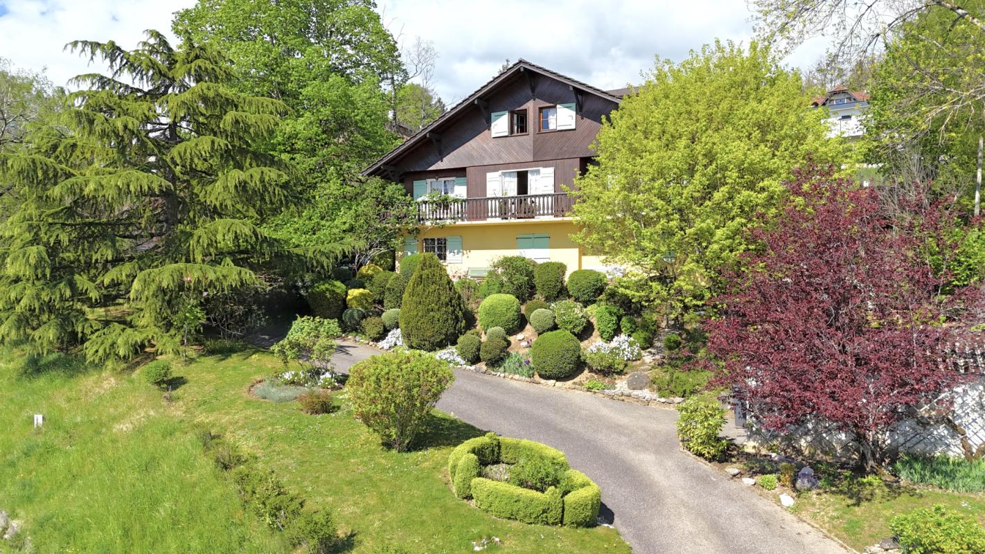 Traditional chalet in Grilly Large traditional chalet in Grilly with landscaped garden and views of the valley and Lake Geneva.