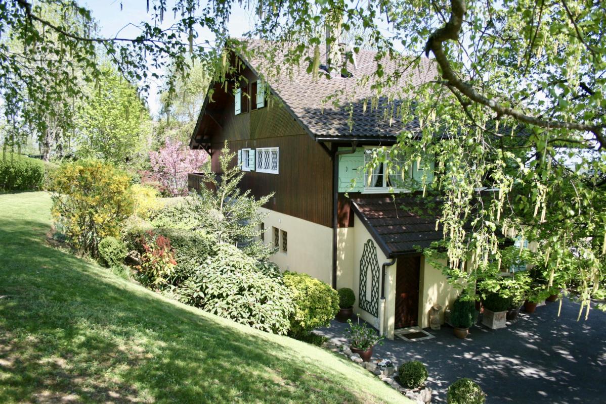 Traditional chalet in Grilly Large traditional chalet in Grilly with landscaped garden and views of the Valley, the Alps and Lake Geneva.