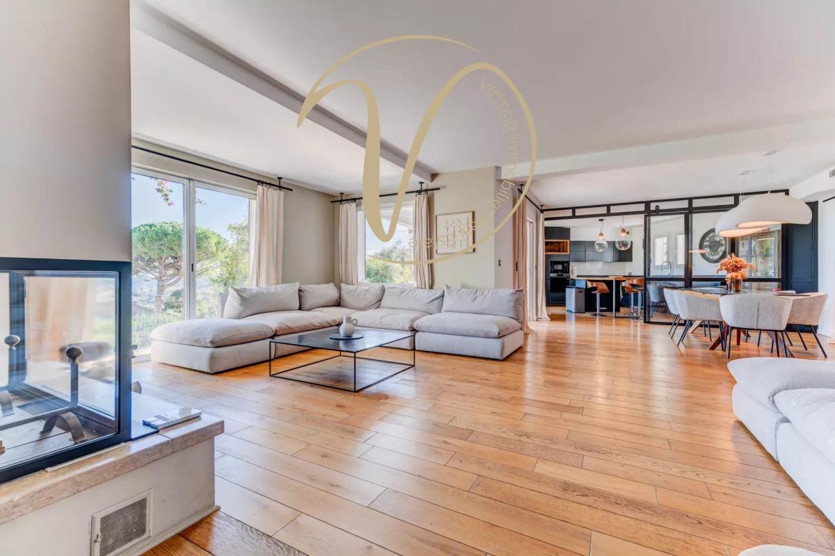 Interior of a villa in La Colle-sur-Loup Interior of a contemporary villa with a spacious and bright living room, overlooking the sea.