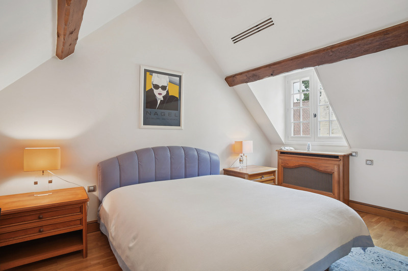 Chambre d’une propriété de prestige Chambre élégante avec lit double et décoration raffinée dans une propriété de prestige.