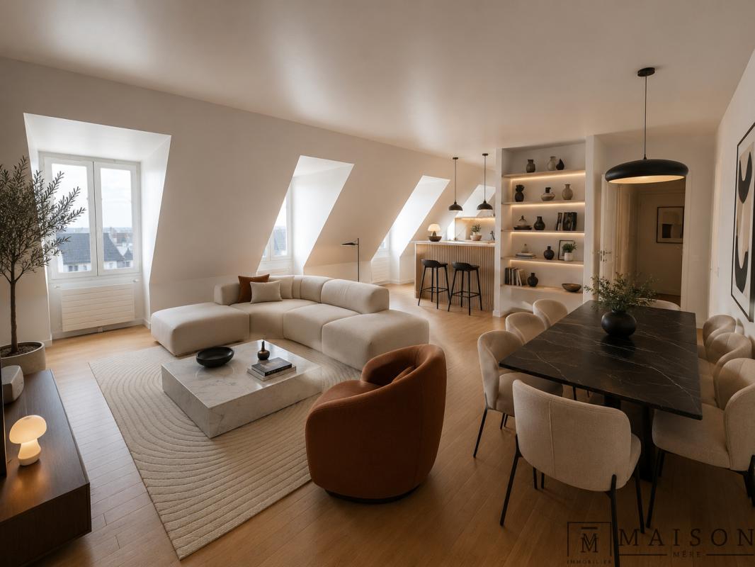 Appartement moderne au dernier étage à Paris Intérieur d'un appartement moderne au dernier étage à Paris, avec salon, salle à manger et cuisine ouverte.