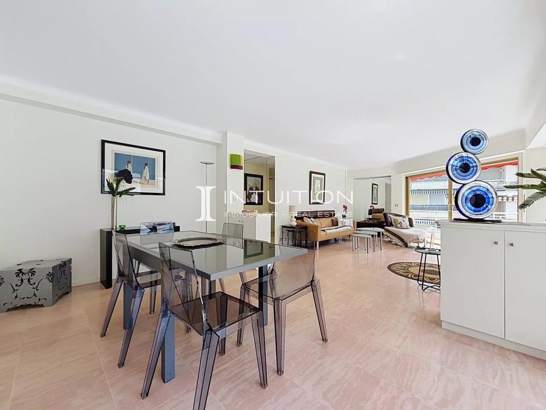 Modern apartment in Cannes Interior of a modern apartment with a bright dining room and living room.