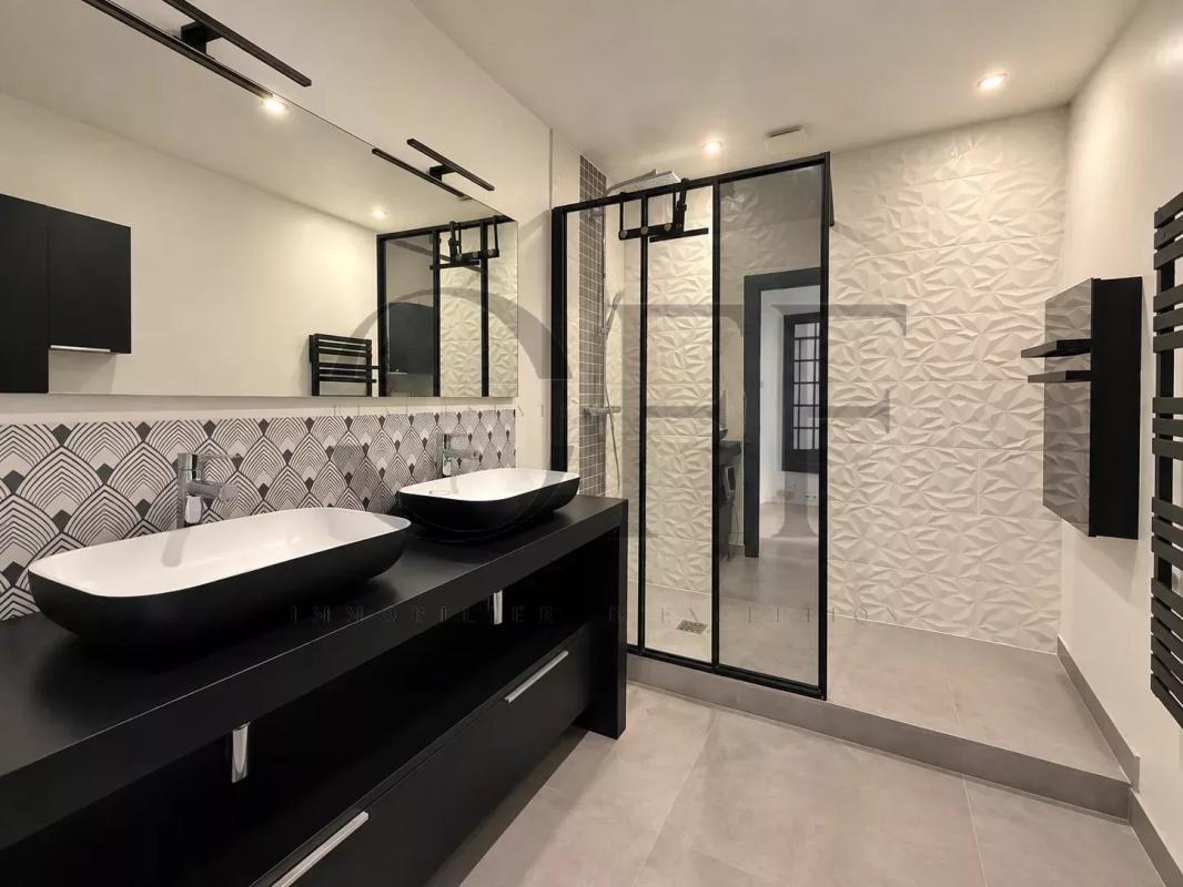 Contemporary bathroom Modern bathroom with double vanity and walk-in shower
