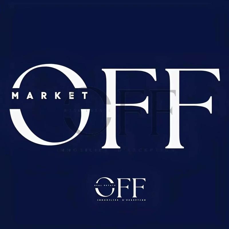 Logo OFF MARKET Logo de l'agence immobilière OFF MARKET sur fond bleu.