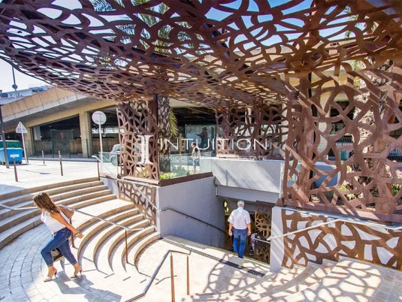 Entrance to a building with a modern architectural design in Cannes, near the train station.