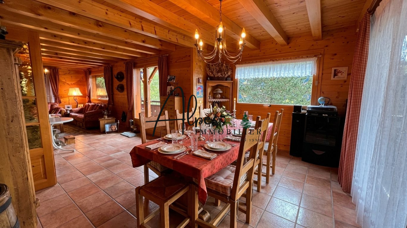 Chalet d’exception à La Clusaz Intérieur d'un chalet en bois avec salle à manger et cuisine, La Clusaz