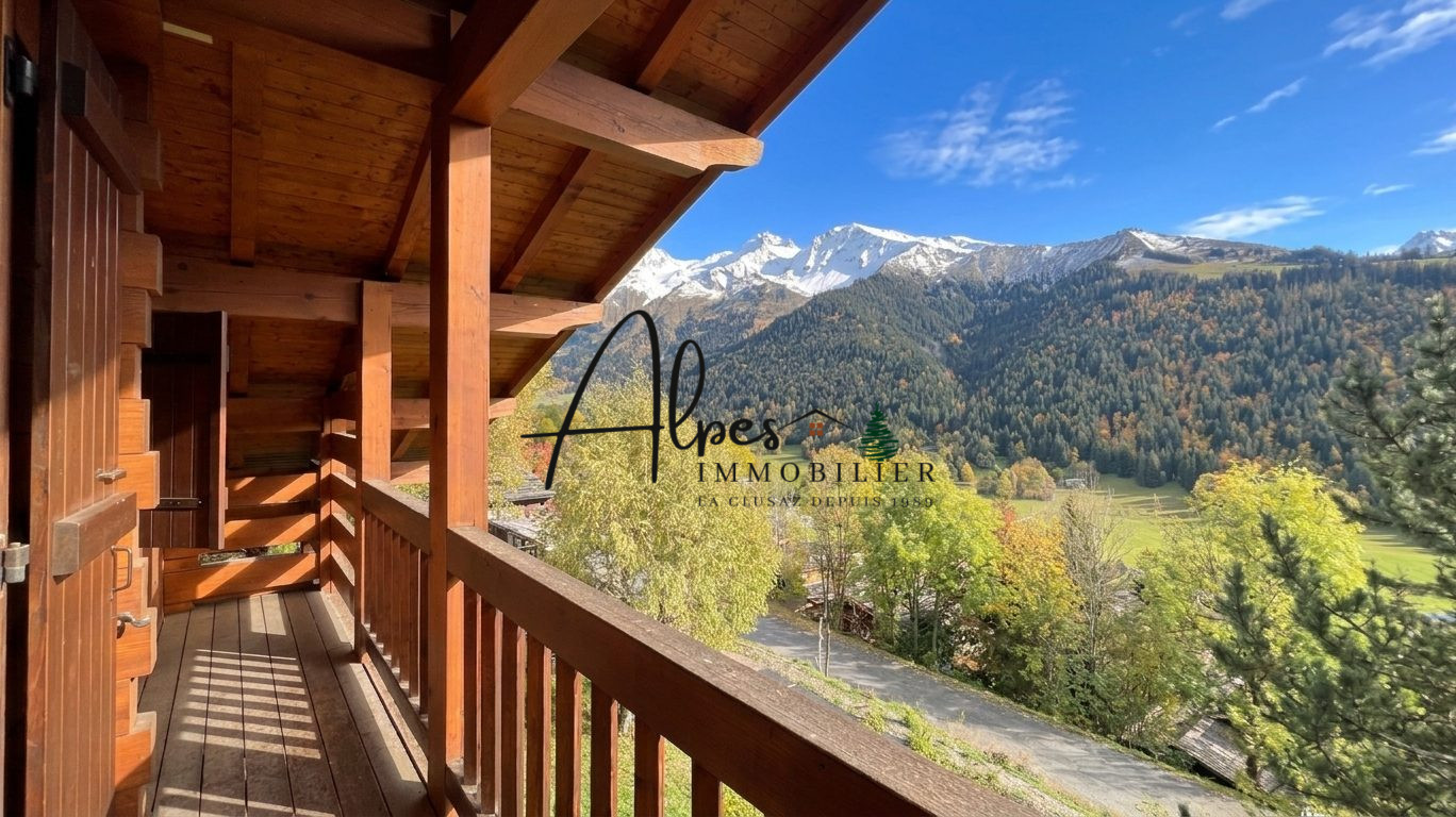 Chalet d’exception à La Clusaz Balcon d'un chalet avec vue sur les montagnes à La Clusaz