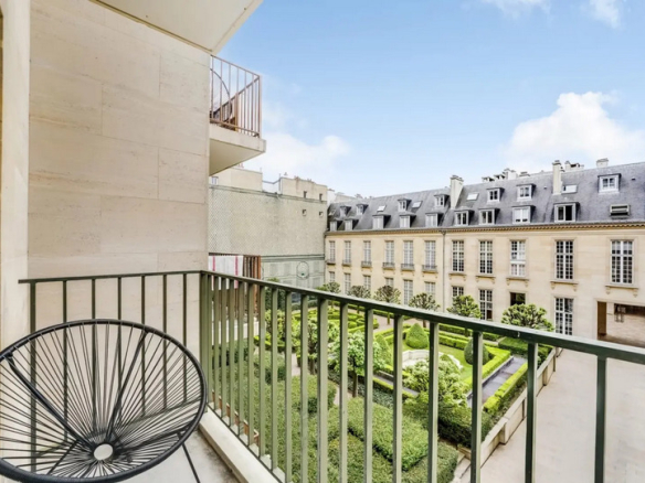 Balcony of an apartment overlooking gardens in the Marais, Paris 3rd arrondissement.