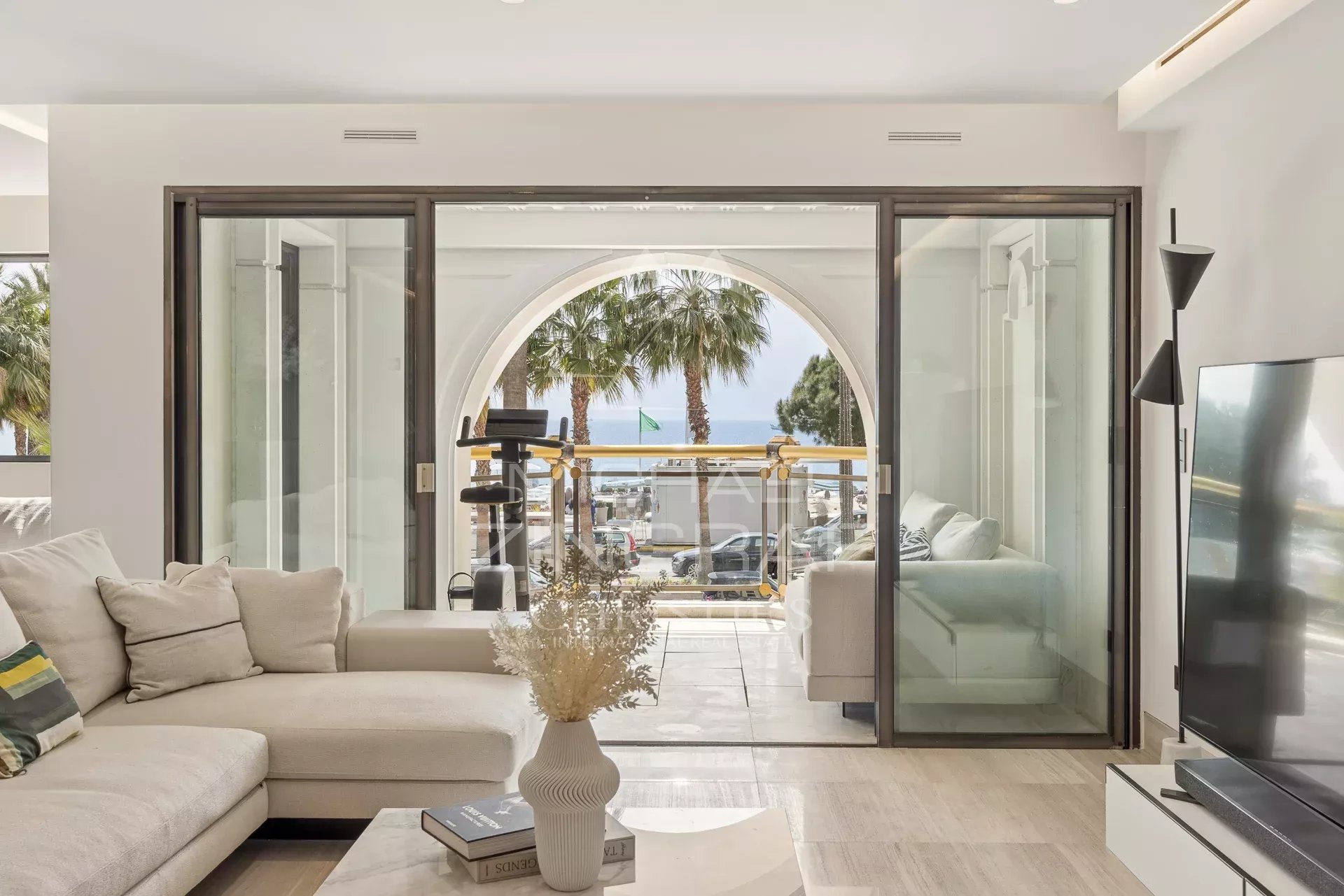 Luxury apartment in Cannes Interior of a luxury apartment with sea views in Cannes, windows open onto a balcony.