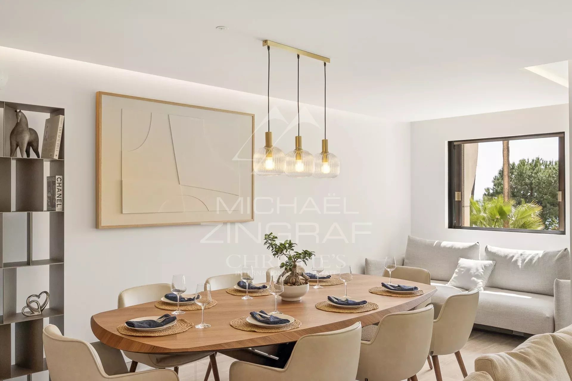 Luxury apartment in Cannes Interior of a modern apartment with a bright dining room and living room.