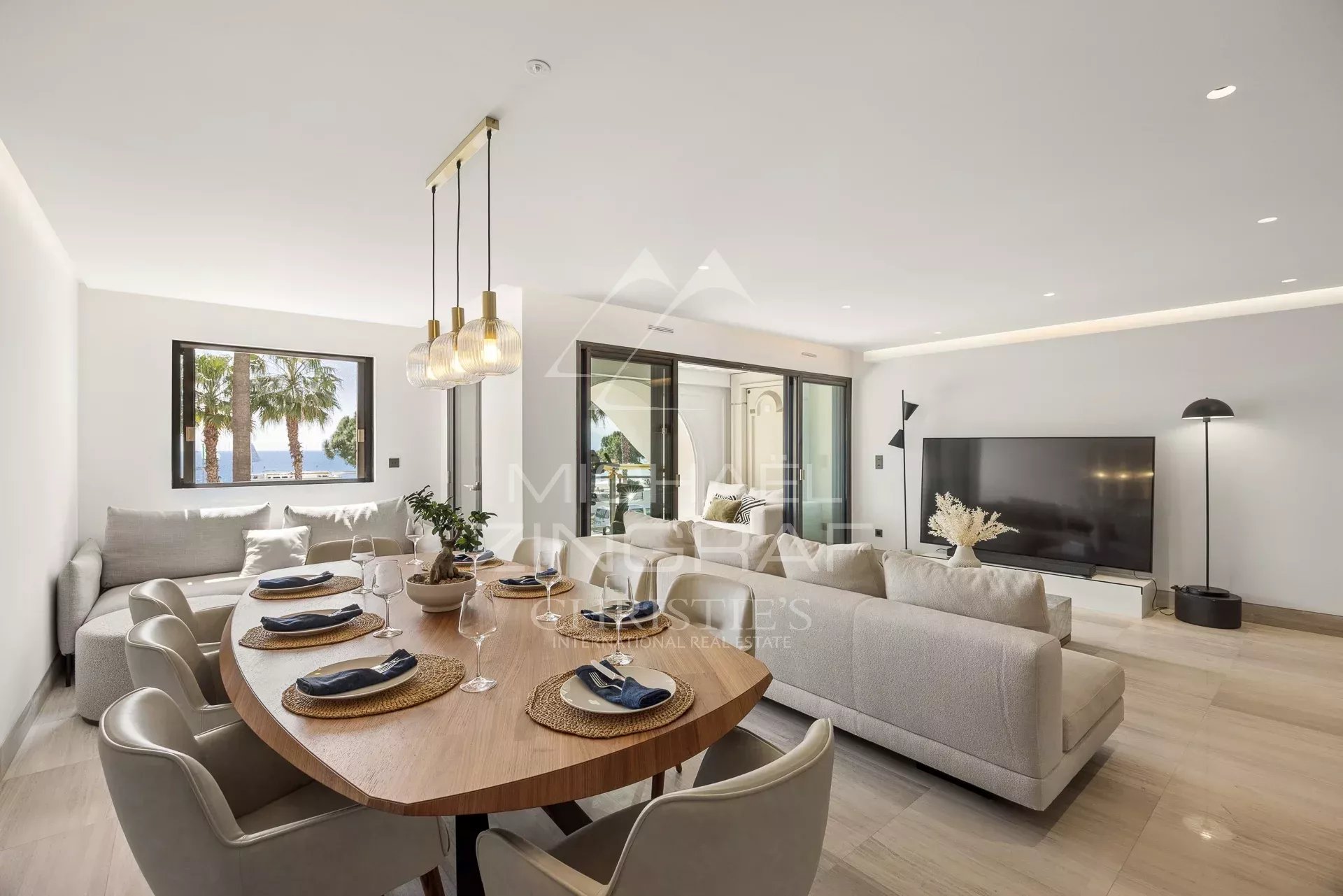 Luxury apartment in Cannes Interior of a luxury apartment in Cannes with sea view, modern living room and dining room.