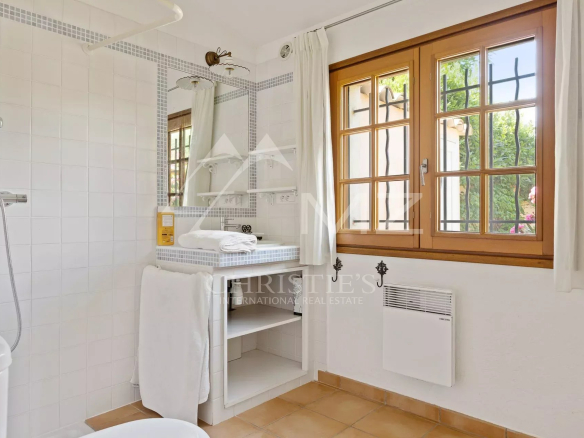 Bathroom with sink and window in Cap d'Antibes