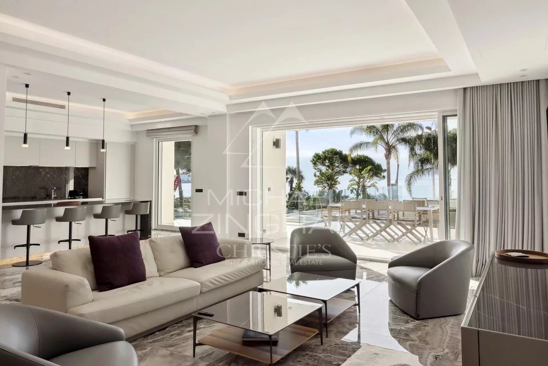 Bright apartment in Cannes Interior of a bright apartment in Cannes with sea view, modern living room and terrace.