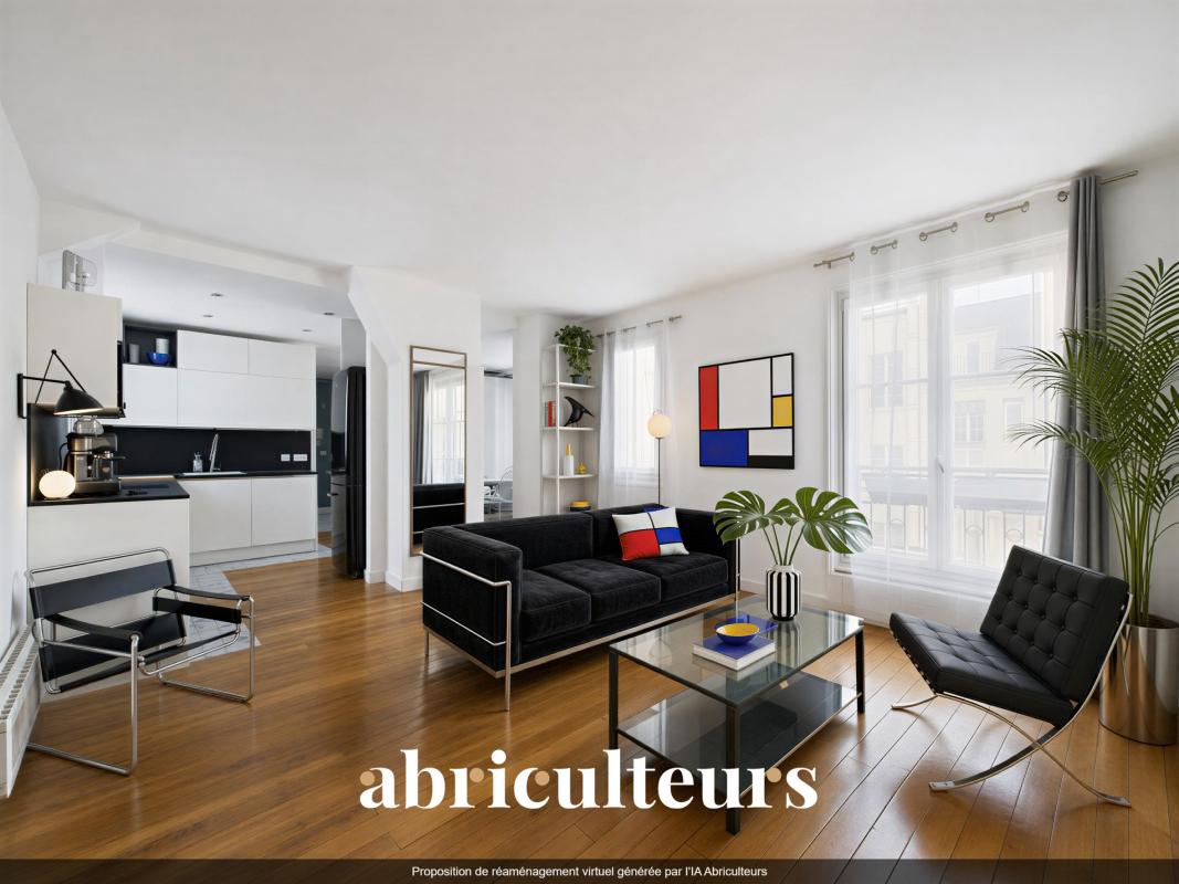 Modern apartment in Paris 16th arrondissement Bright living room of a modern apartment with parquet flooring and contemporary furniture in Paris 16th arrondissement.