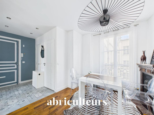 Interior of a through apartment with dining room and modern decor.