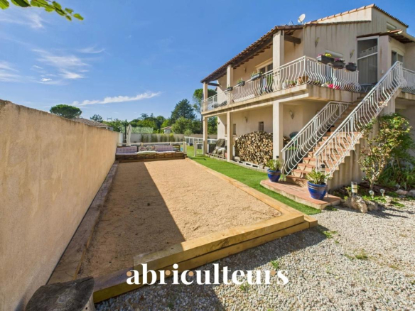 Family home with garden and outbuilding in Bouc-Bel-Air, exterior view.