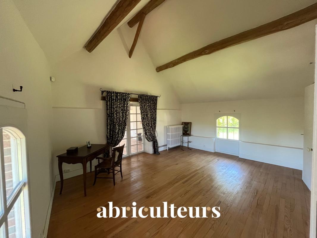 Interior of a 19th-century house in Croisilles Interior of a renovated 19th century house in Croisilles, with a wooden floor and exposed beams.