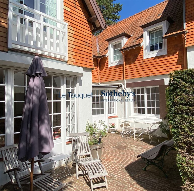 Appartement haut de gamme avec terrasse et garage, idéalement situé