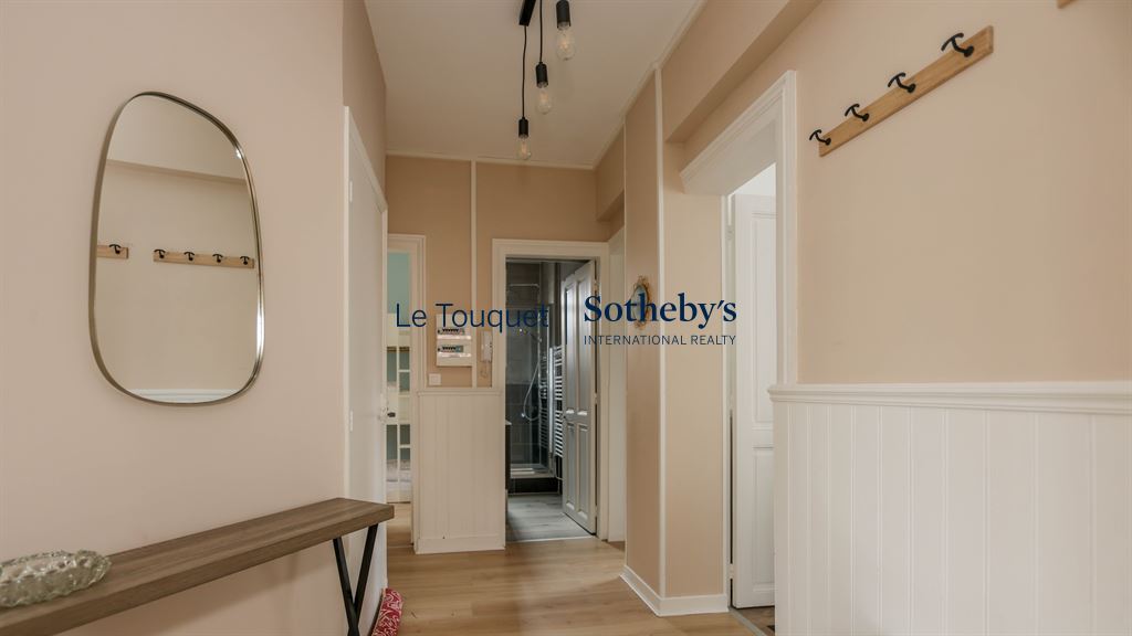 Renovated apartment hallway Hallway of a renovated apartment with light walls and elegant decor, Le Touquet-Paris-Plage