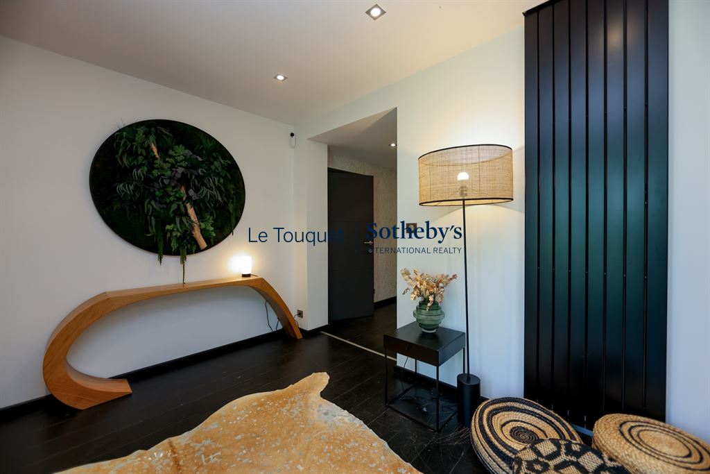 Modern interior of a family villa Interior of a contemporary villa with modern decor and soft lighting.